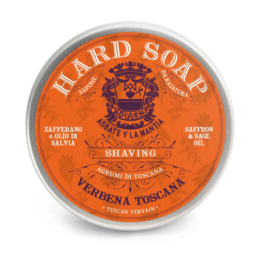 Orange hard soap tin with silver lid on a white background