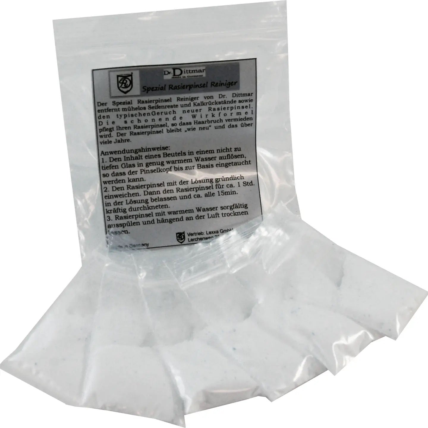 Clear plastic bag with white powder and a label on a white background