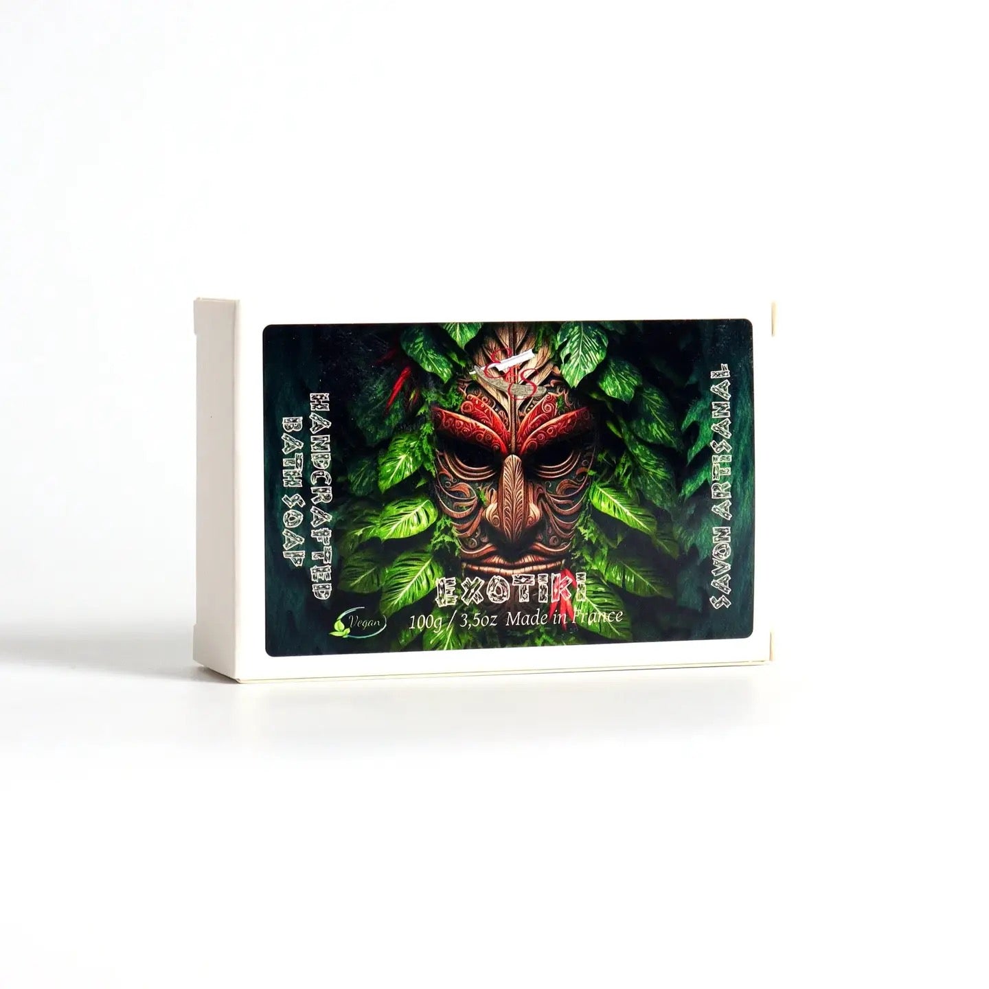 Exotic Savon Artisanal soap packaging with leaf design on a white background