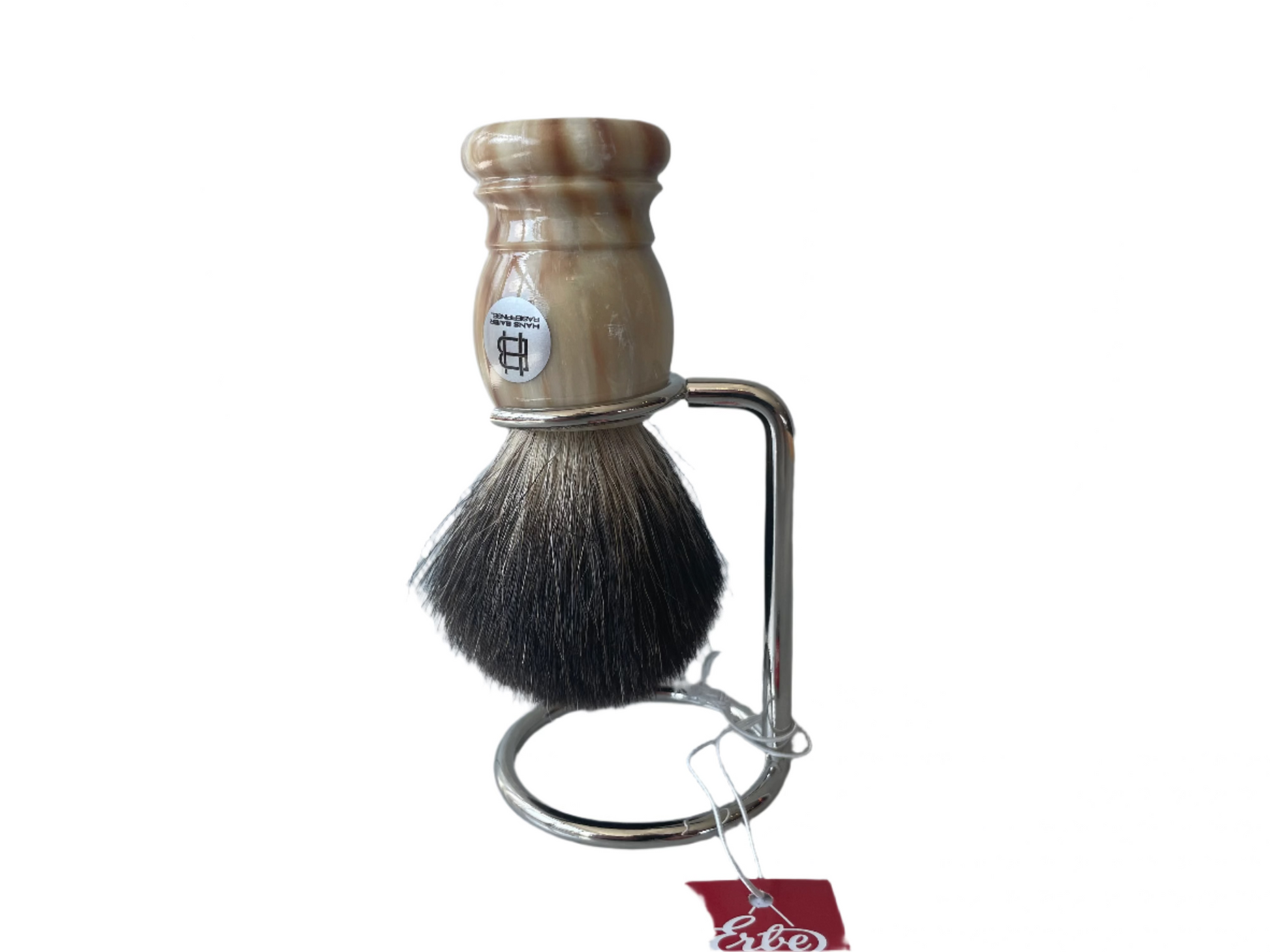 Shaving brush with brown handle and black bristles on a stand against a light gray background