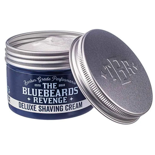 Open container of The Bluebeards Revenge Deluxe Shaving Cream with visible branding.