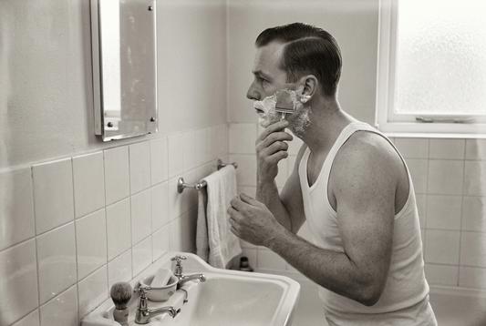 man shaving from the 1950