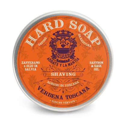 Orange hard soap tin with silver lid on a white background