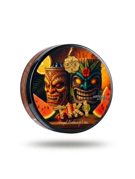 Decorative object with tiki design and watermelon, featuring the brand 'Artemis'.