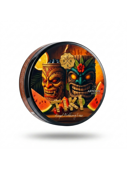 Decorative object with tiki design and watermelon, featuring the brand 'Artemis'.