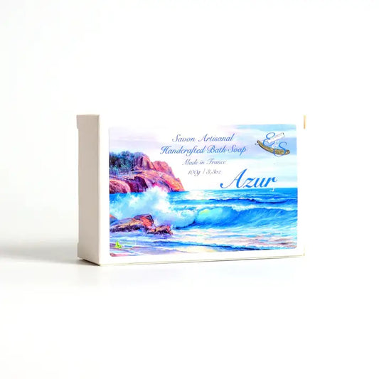 Bar of soap with a scenic packaging design on a white background