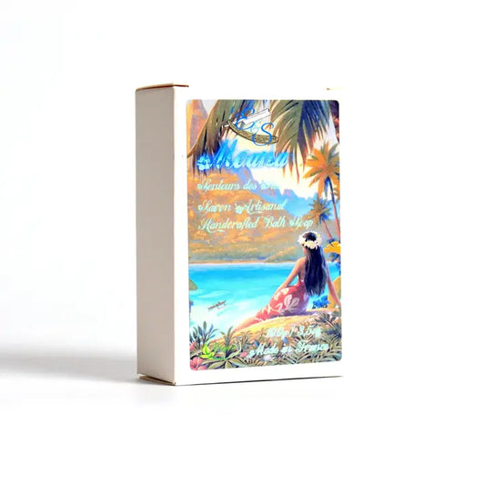 Product packaging with a scenic design of a woman on a beach and palm trees.