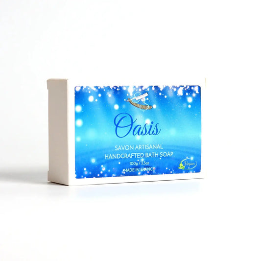 Handcrafted bath soap bar with 'Oasis' packaging on a white background