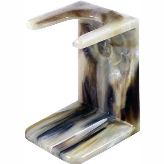 shaving brush stand with a marbled pattern on a white background