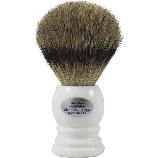 Shaving brush with white handle and brown bristles on a white background