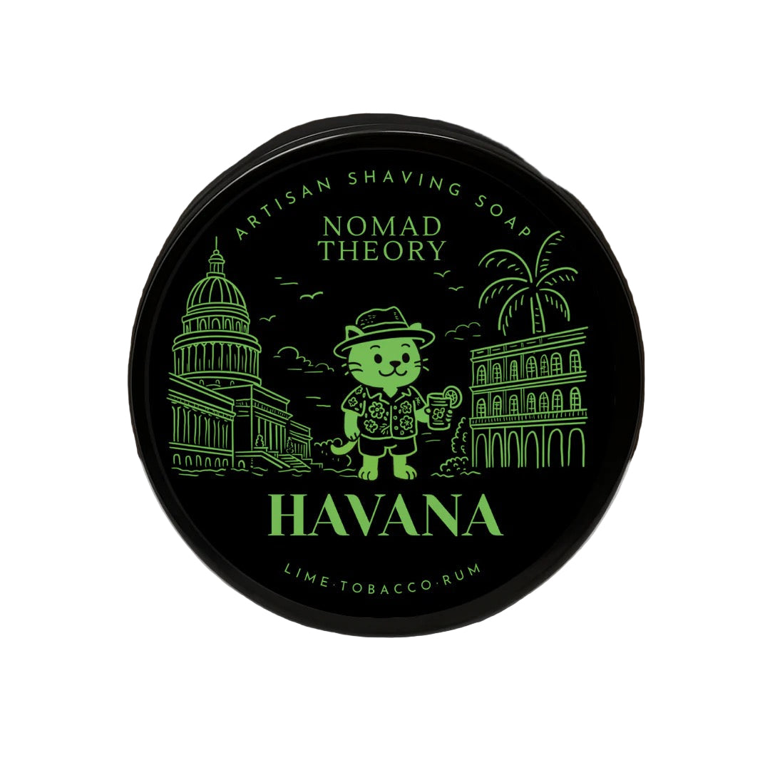 Nomad Theory Havana shaving soap container on a marble surface with a dark background
