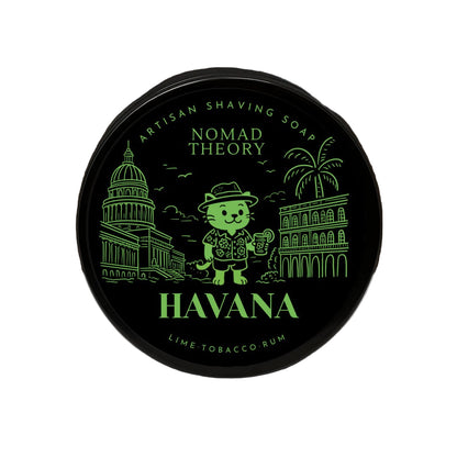 Nomad Theory Havana shaving soap container on a marble surface with a dark background