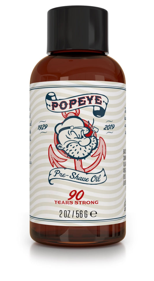 Bottle of Popeye pre-shave oil with a white label on a white background