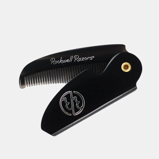 Black comb with gold accent on a white background, featuring 'Rockwell Razors' branding.