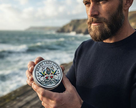 man holding tin ofSea Dog Beard Balm | Natural Moisturizing Beard Care