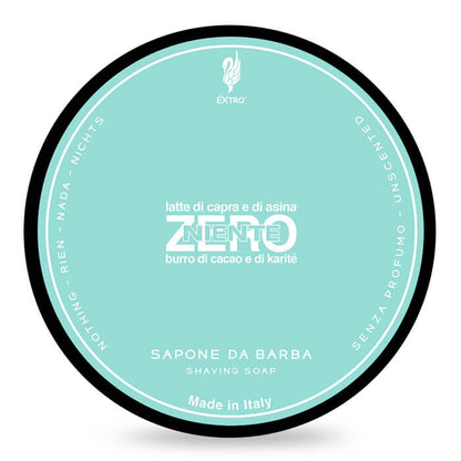 A round tin of EXTRO shaving soap labeled 'ZERO' with a light aqua background, black outer rim, and white text on a white background.